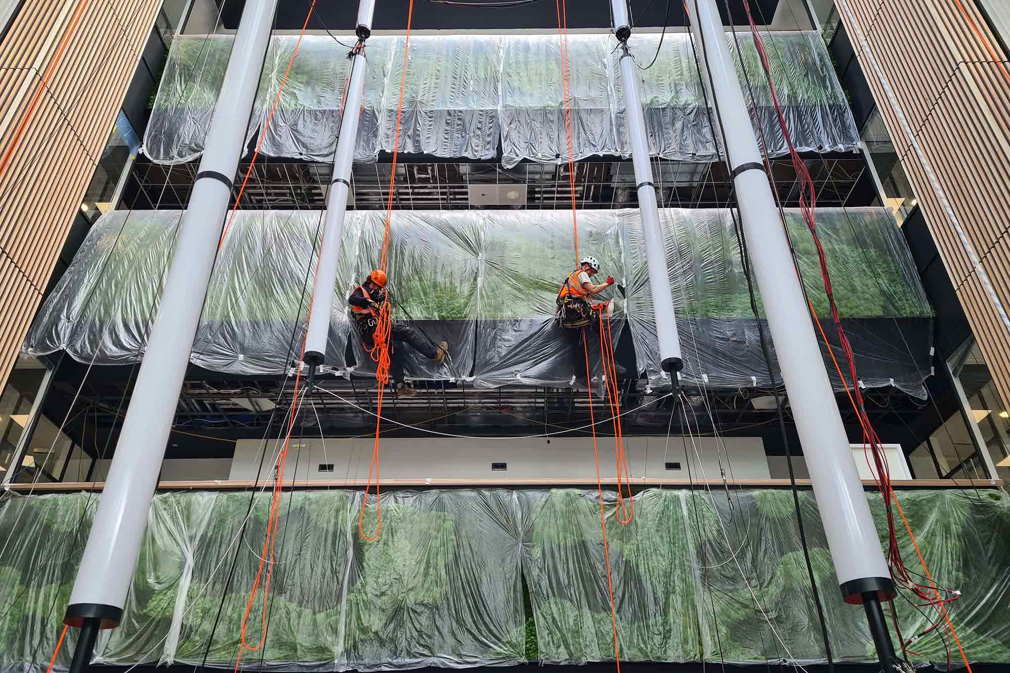 Alpha RAT team performing steel maintenance via abseiling