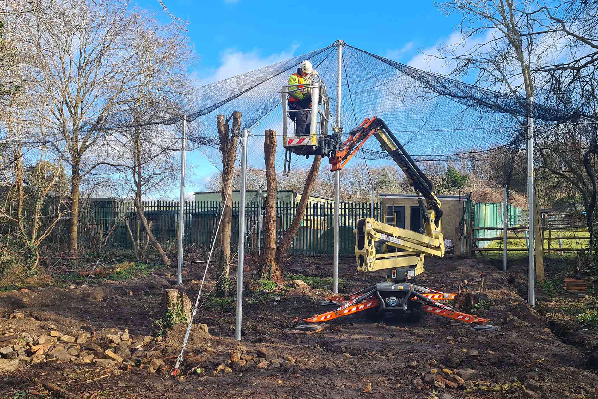 Installation of soundproof cladding on commercial roof